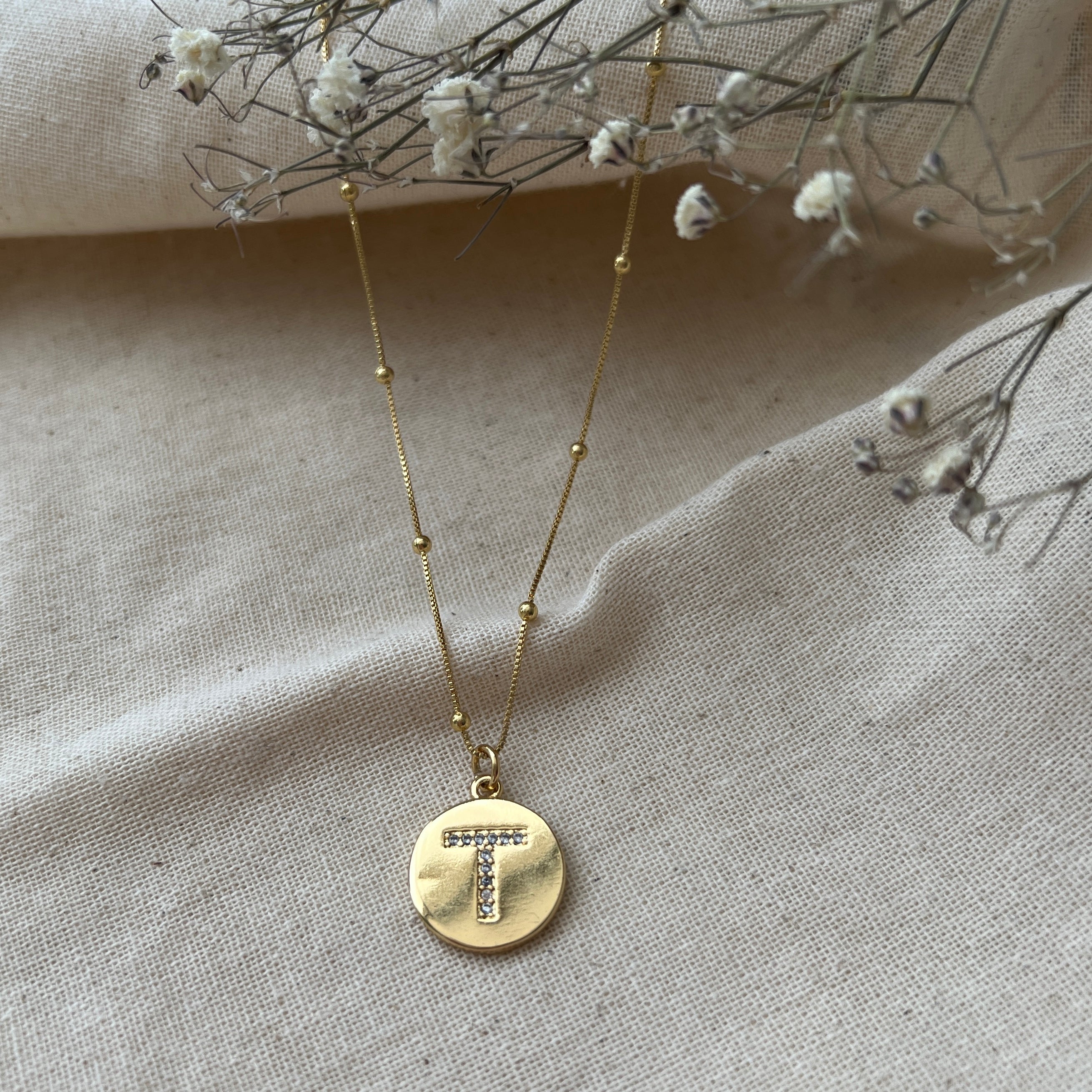 Collar letra T Circones