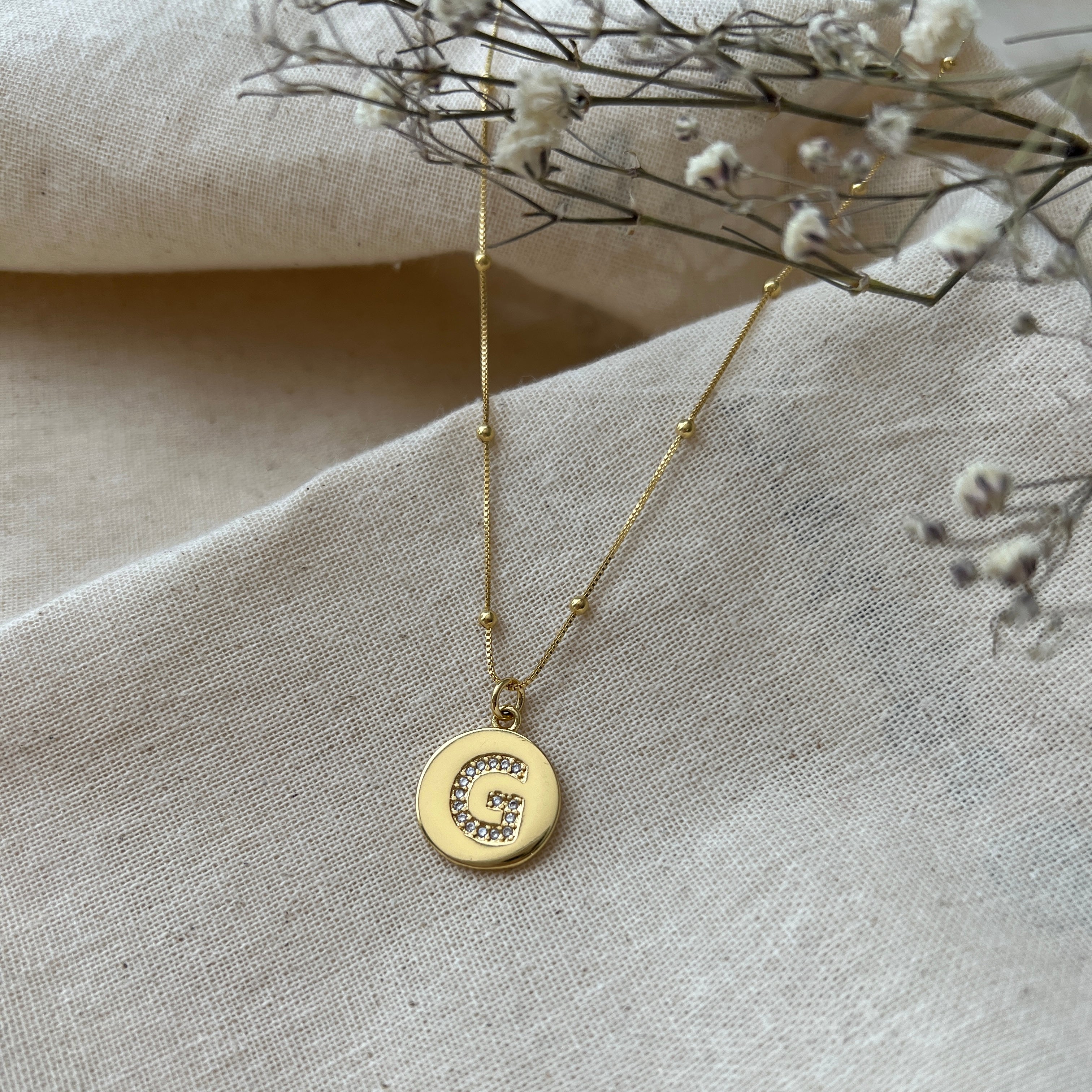 Collar letra G circones