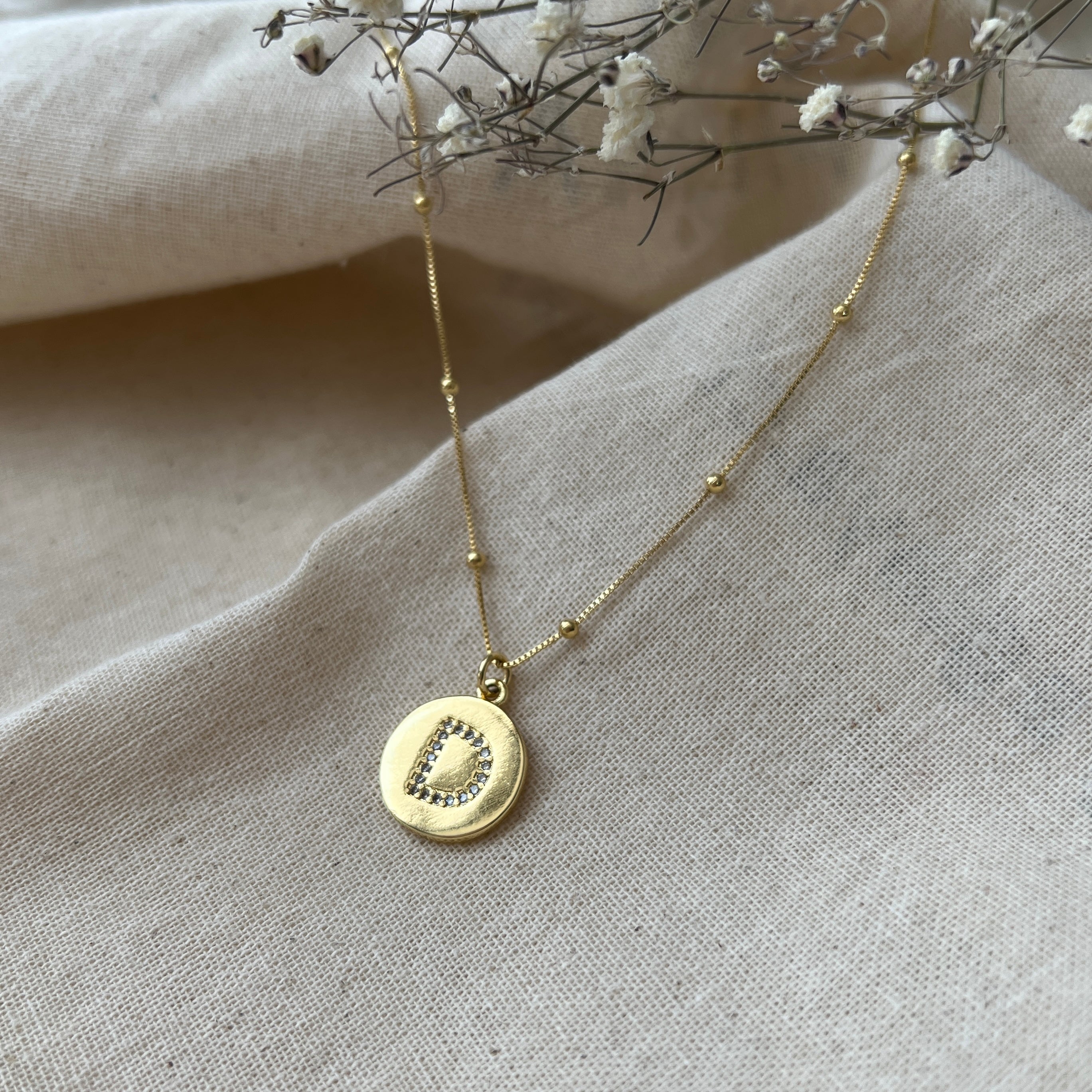 Collar letra D circones